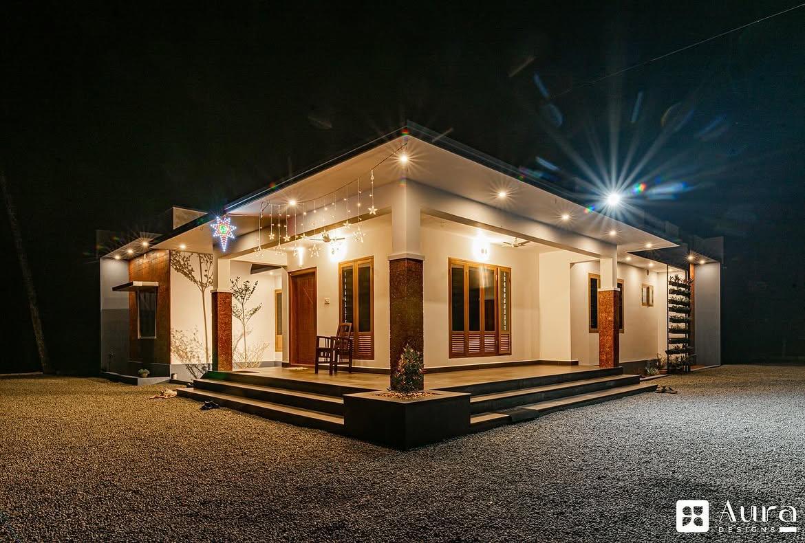 Aura Horizon Villa — luxury single-story Kerala villa with warm evening lighting